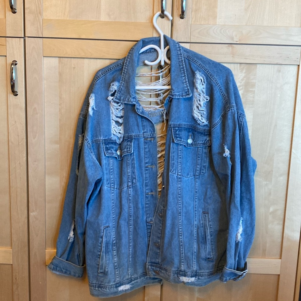 Majorly distressed jean jacket